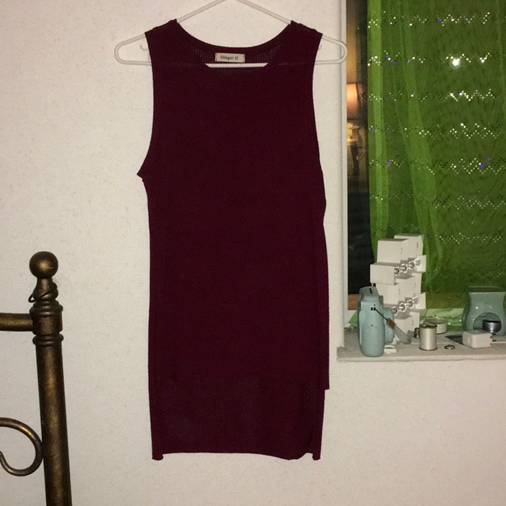 A long maroon tank top